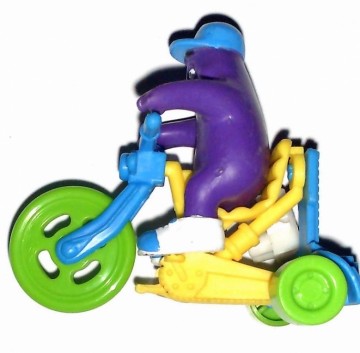McDonalds - Paars monster op groen/gele fiets - Happy Meal Fietspret 1991